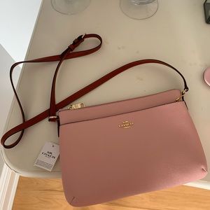 New with tags Coach crossbody bag in pink